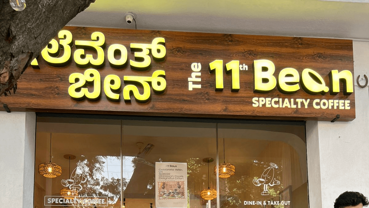 The 11th Bean cafe exterior — entrance on Tata Silk Farm Road